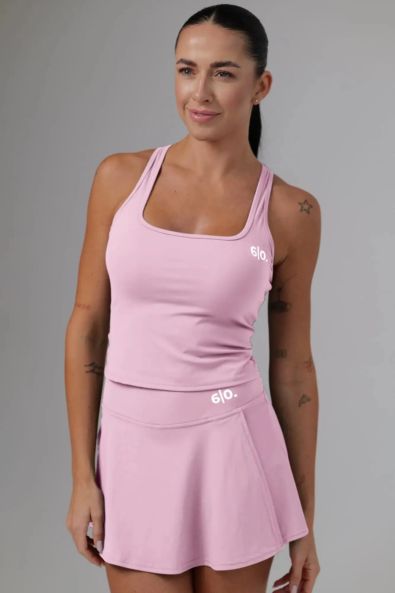 White soft material top and skirt set