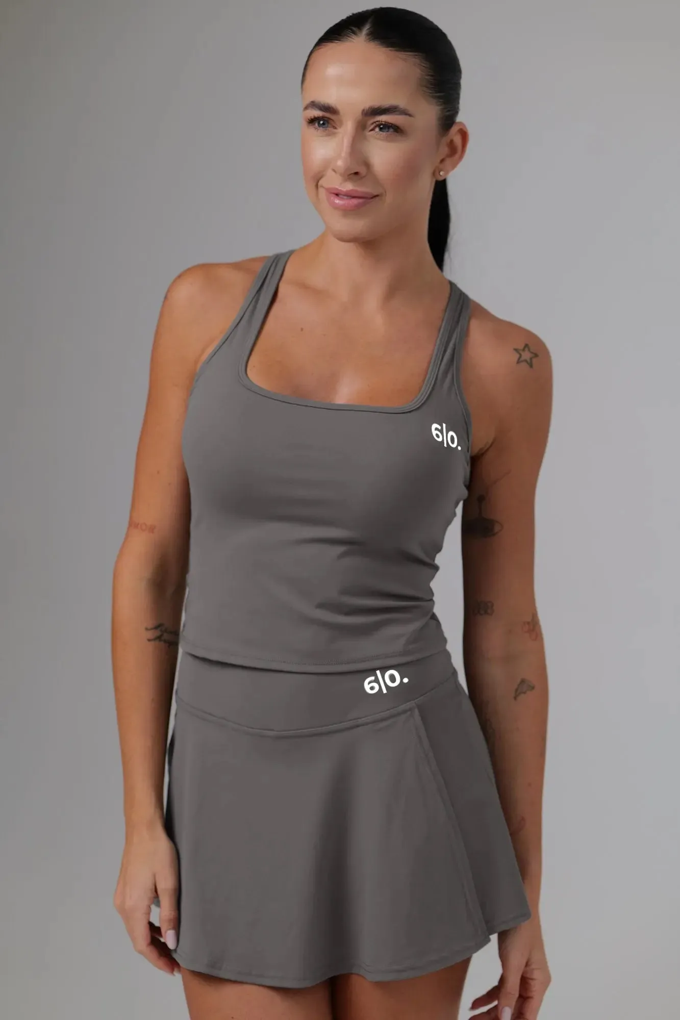 White soft material top and skirt set
